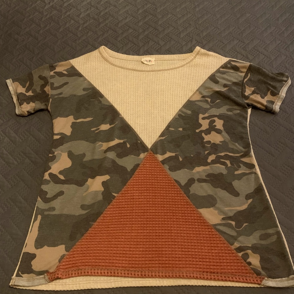 Camo shirt with orange and tan. Worn occasionally. Like new. Smoke free home